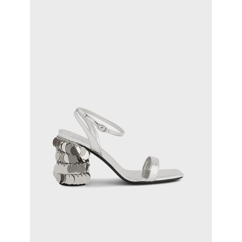 Silver sandals with sparkle discs heels