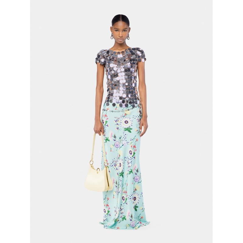 The iconic silver sparkle discs top