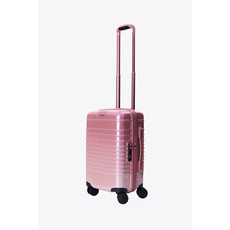 The Small Carry-On Roller in Wicked Pink