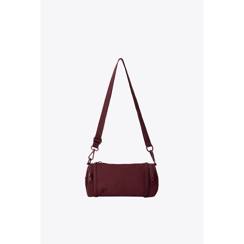 The Expandable Crossbody Charm in Burgundy