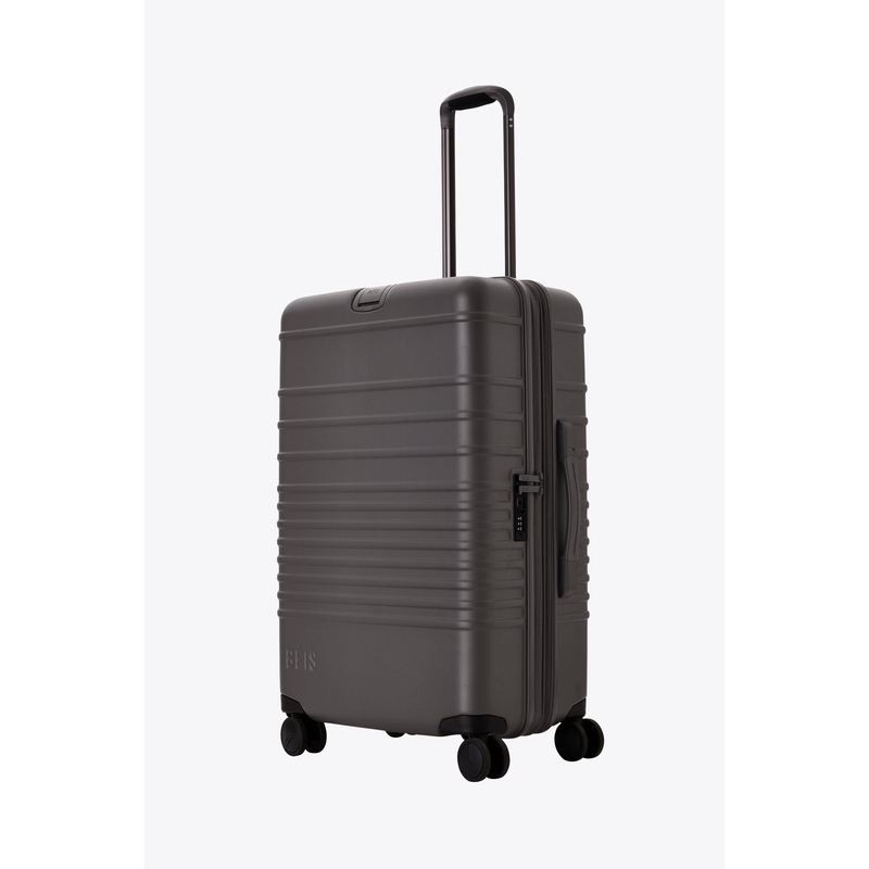 The Medium Check-In Roller in Charcoal