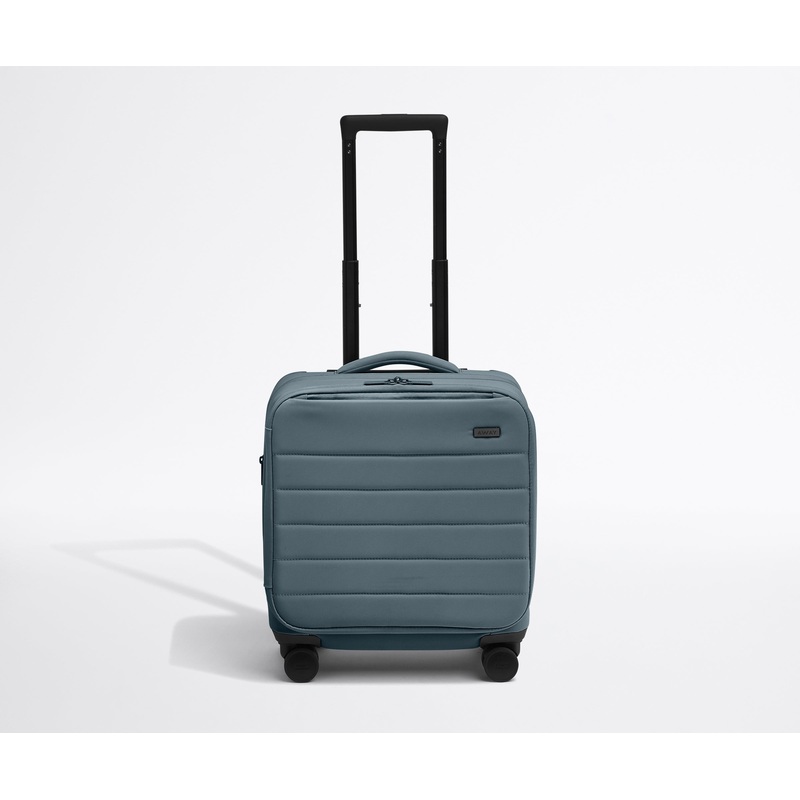 The Softside Compact Carry-On in Coast Blue Jet Black