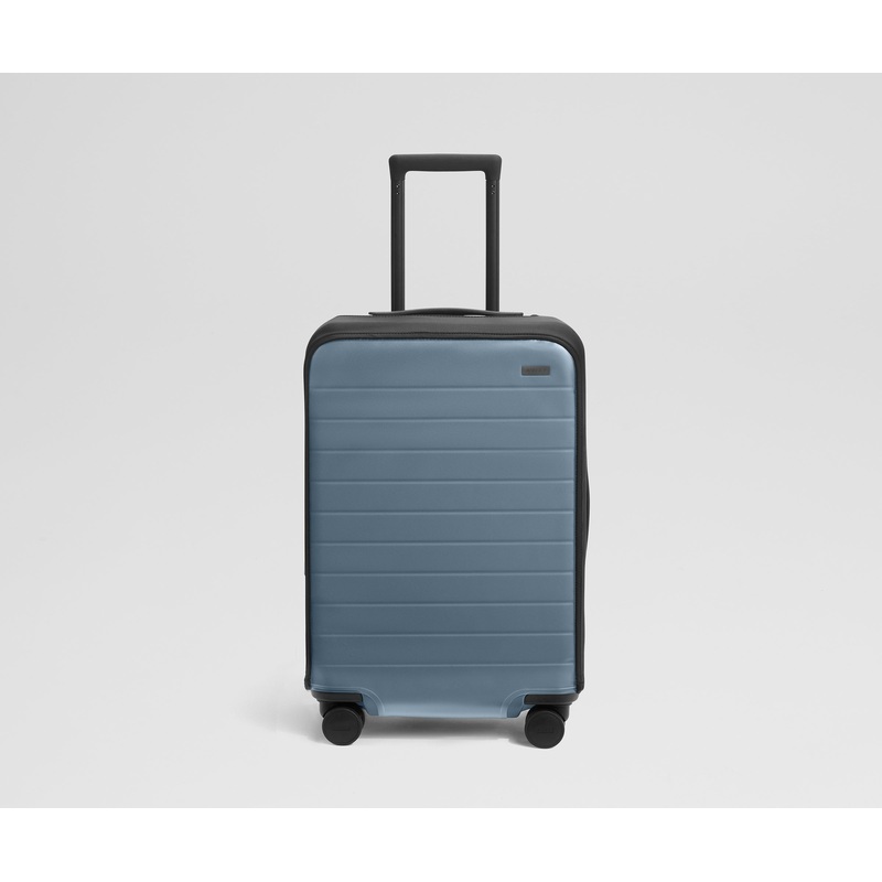 Clear Luggage Cover in The Bigger Carry-On